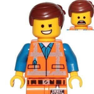 May include: A Lego Emmet minifigure with a yellow head, brown hair, and an orange construction vest. The figure has blue arms, orange legs, and the name "EMMET" printed on the front. A second head with a different expression is also visible.