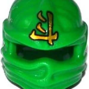 May include: A bright green ninja mask with a gold emblem on the forehead. The mask has a textured appearance and covers the entire head and lower face, with openings for the eyes and mouth. The emblem is a stylized Japanese character.