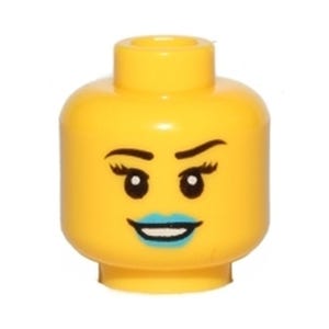 May include: A yellow plastic toy head with a cylindrical top stud. The face features black printed eyes with long eyelashes, a single raised eyebrow, and a wide smile with bright blue lipstick and visible white teeth.