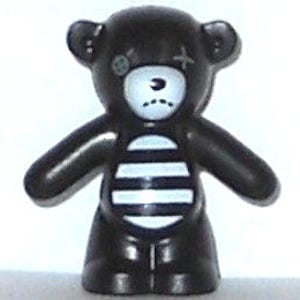 Schwarzer Lego-Teddybär mit dunkelblaugrauem Knopfauge und Naht, weißer Schnauze und gestreiftem Bauchmuster