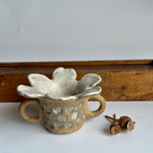 Flower handled vase