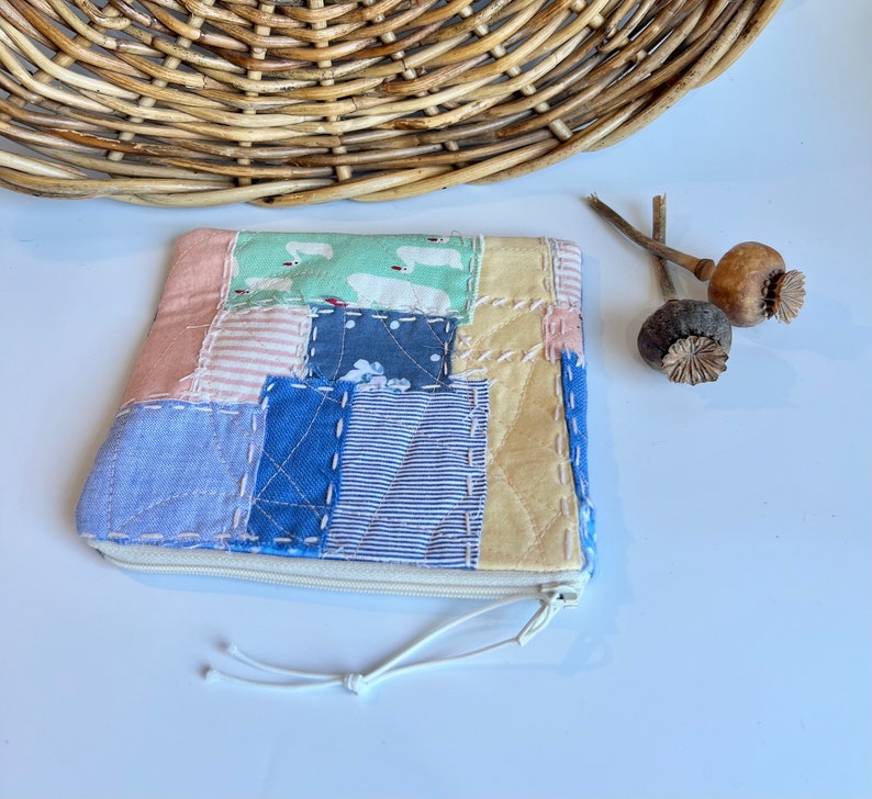 Small white zip pouch image 1