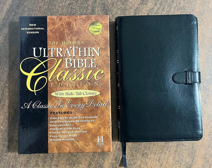 NIV 1984 Ultrathin Bible with Slide Tab Closure - Black Bonded Leather - out of print NIV (Thinline Size)