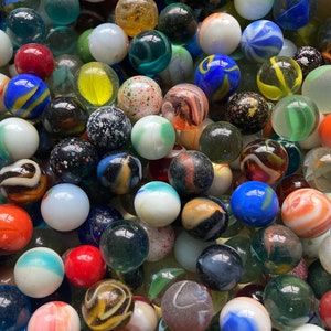 150 marbles, vintage and modern glass marbles in different colors, target marbles with shooters, bulk mix of collectible marbles
