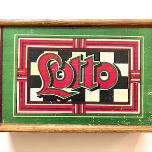 Vintage lotto tombola game in wooden box, antique bingo with 90 numbers, game tiles, bingo chips and cards, loto or house