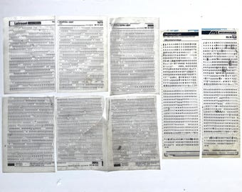 Vintage dry transfer sheets, used Letraset and Mecanorma rub on, small sized Helvetica font letters and numbers