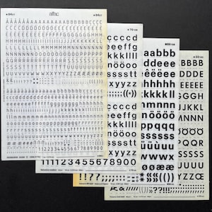 4 dry transfer letters Alfac, Letraset instant lettering, rub on letter and number sheets