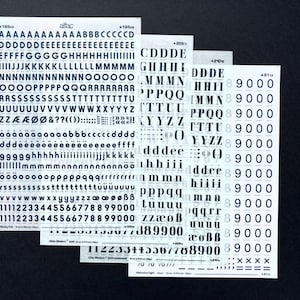 4 dry transfer letters Alfac, Letraset instant lettering, letter font rub on transfer letter sheets, Letraset letters and numbers