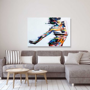 May include: Abstract painting of a person with colorful lines and shapes on a white background.