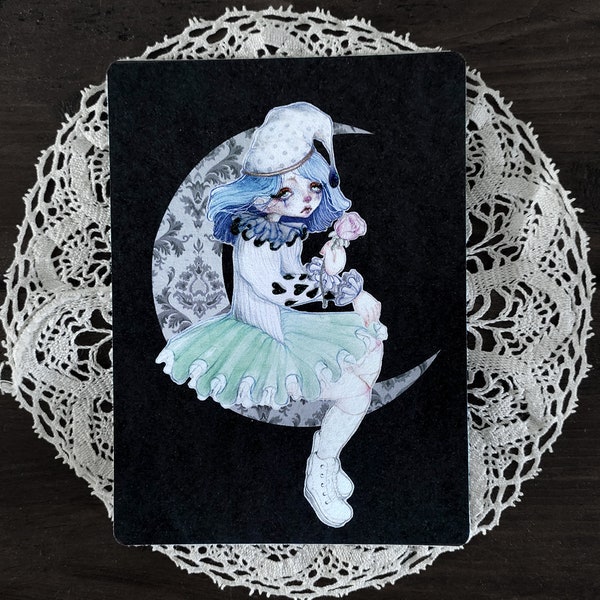 Carte postale poupée style pierrot la lune avec une rose ambiance nocturne rêve et rêverie