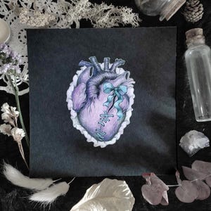 May include: A hand-drawn illustration of a purple heart with stitches and a blue ribbon on a black background.
