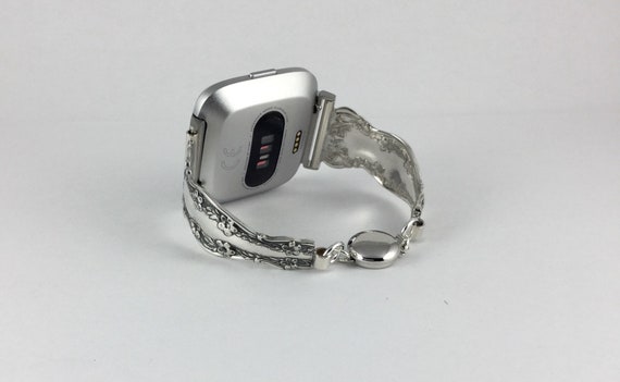 Versa watch hotsell band size