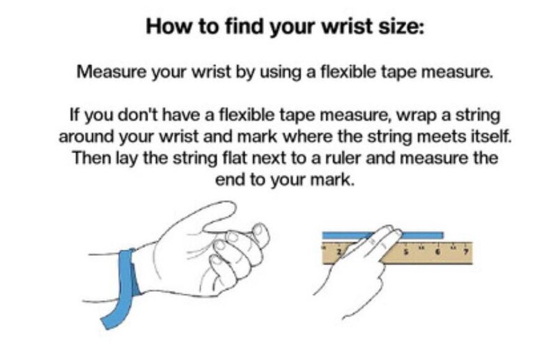 May include: An instructional graphic titled How to find your wrist size. It provides text instructions on using a flexible tape measure or string and a ruler to measure a wrist. Two illustrations show a blue tape around a wrist and a blue string on a ruler.