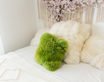 green fuzzy pillow