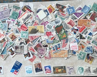 Lot of 100+ misc. American postage stamps most cancelled some not used
