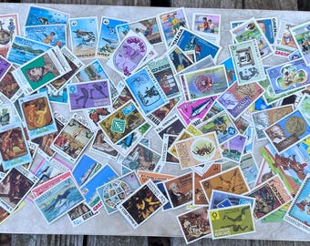 Lot of 100+ mid 1970s Grenada Grenadines postage stamps Disney Sports Nature Art Christmas Easter never cancelled Excellent condition