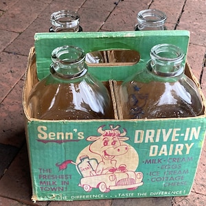 Waxed cardboard carton with 4 half gallon glass milk bottles  Senn's Drive-In Dairy