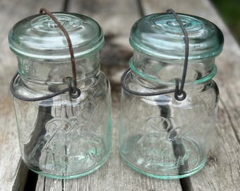 Lot of 2 light blue antique Ball Ideal pint jars with glass tops and wire bails early 1900s  062640089
