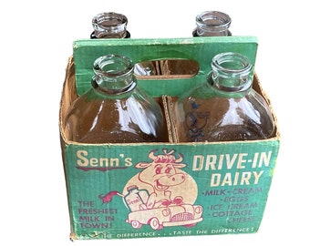 Waxed cardboard carton with 4 half gallon glass milk bottles  Senn's Drive-In Dairy