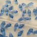 12 pieces Swarovski #6000 13x6.5mm Crystal Light Sapphire Teardrop Faceted Pendant Beads