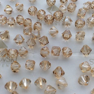 Swarovski 5301 Crystal Golden Shadow Bicone Faceted Beads 3mm 4mm 5mm 6mm image 2