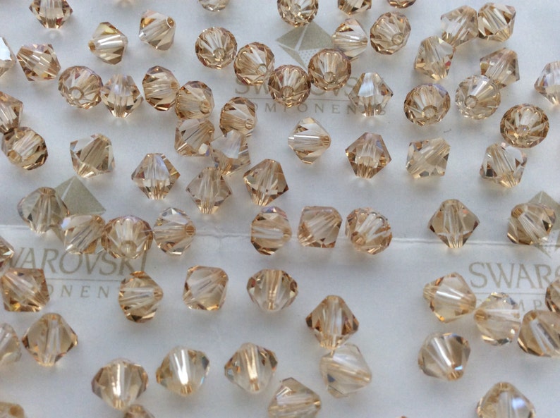 Swarovski 5301 Crystal Golden Shadow Bicone Faceted Beads 3mm 4mm 5mm 6mm image 2