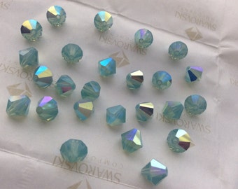 24 pieces Swarovski #5301 8mm Crystal Pacific Opal AB Bicone Faceted Beads