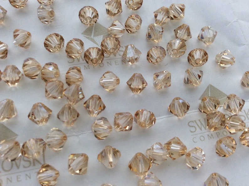 Swarovski 5301 Crystal Golden Shadow Bicone Faceted Beads 3mm 4mm 5mm 6mm image 1