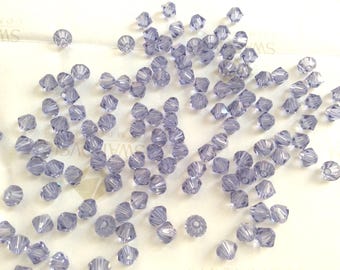 100 pieces Swarovski #5301 4mm Crystal Light Tanzanite Bicone Faceted Beads