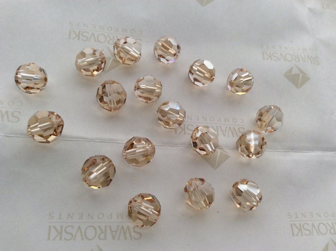 SWAROVSKIのアンクレット 花柄 Una Angelic bangle, Clover, White, Rose gold-tone plated