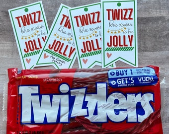 May include: A package of strawberry Twizzlers candy with several gift tags. The tags read "TWIZZ the season to be JOLLY" in red and green. The candy package is red with the Twizzlers logo in white.