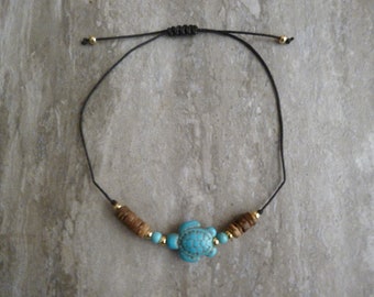 Howlite Turtle & Coconut Shell Wax Cord Bracelet.