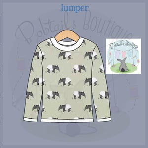 May include: A light green jumper with a repeating pattern of black and white tapirs. The jumper features a white collar and cuffs. The word "Jumper" is written in blue script at the top. The brand logo is in the upper right corner.