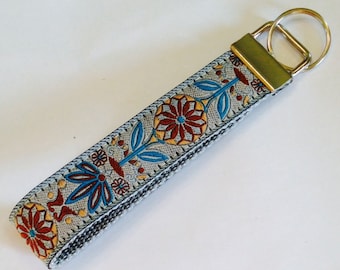Jacquard Designer Zinnia Ribbon Wristlet Key Fob/Designer Dog Collar :Silver/Turquoise Beige Flower Luggage/Backpack Tag, Quilter/Sewing Fob