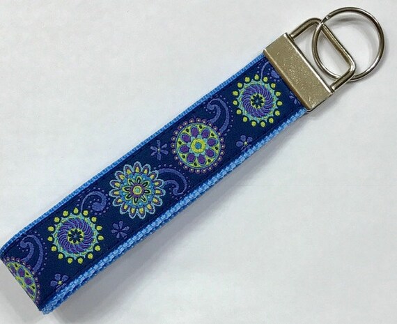 Designer wristlet deals keychain