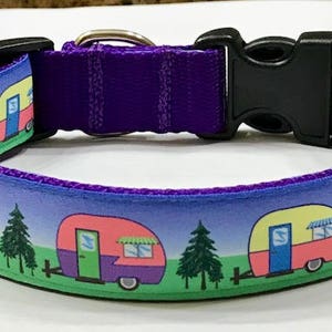 May include: Purple dog collar with a blue and green pattern of vintage campers. The pattern repeats with yellow, pink, and purple campers.