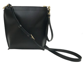 Svart läderaxelbandshållare