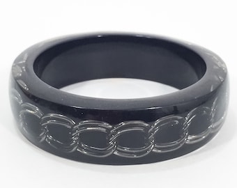 Vintage clear lucite and chain bangle black back. Thermoplastic resin. Silver tone chain bangle bracelet.