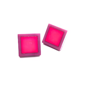 Genuine Buch Deichmann 1983 Earrings, pierced. Hot pink/ Dusty Purple. EVC. 3/4” They’re in perfect condition