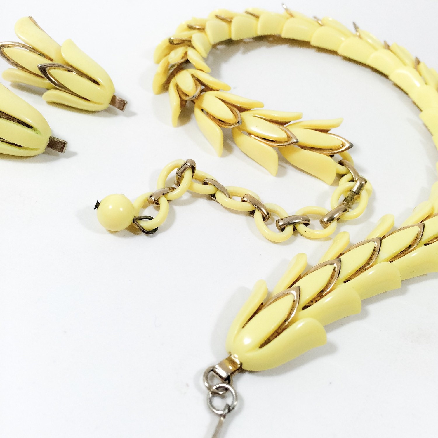 Vintage signed Coro choker with white thermoplastic squares set in goldtone metal.