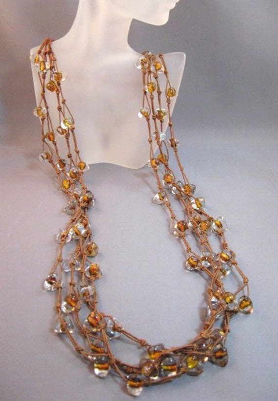 Glass beads brown knotted cord long necklace