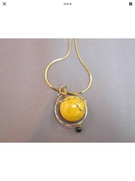 Round butter amber gold tone metal necklace penda… - image 5