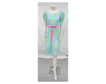 Vestido vintage de Lilly Pulitzer de los años 80 con estampado floral, bajo calado y mangas abullonadas.