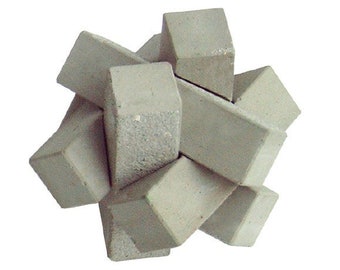 concrete 3D burr puzzle “Knot” chinese interlocking put together brainteaser cement gray gift architect brutalist think
