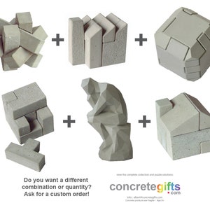 concrete Giftbox gift set containing six different intriguing concrete gifts: Cube, knot, factory, house, box, “the Thinker”