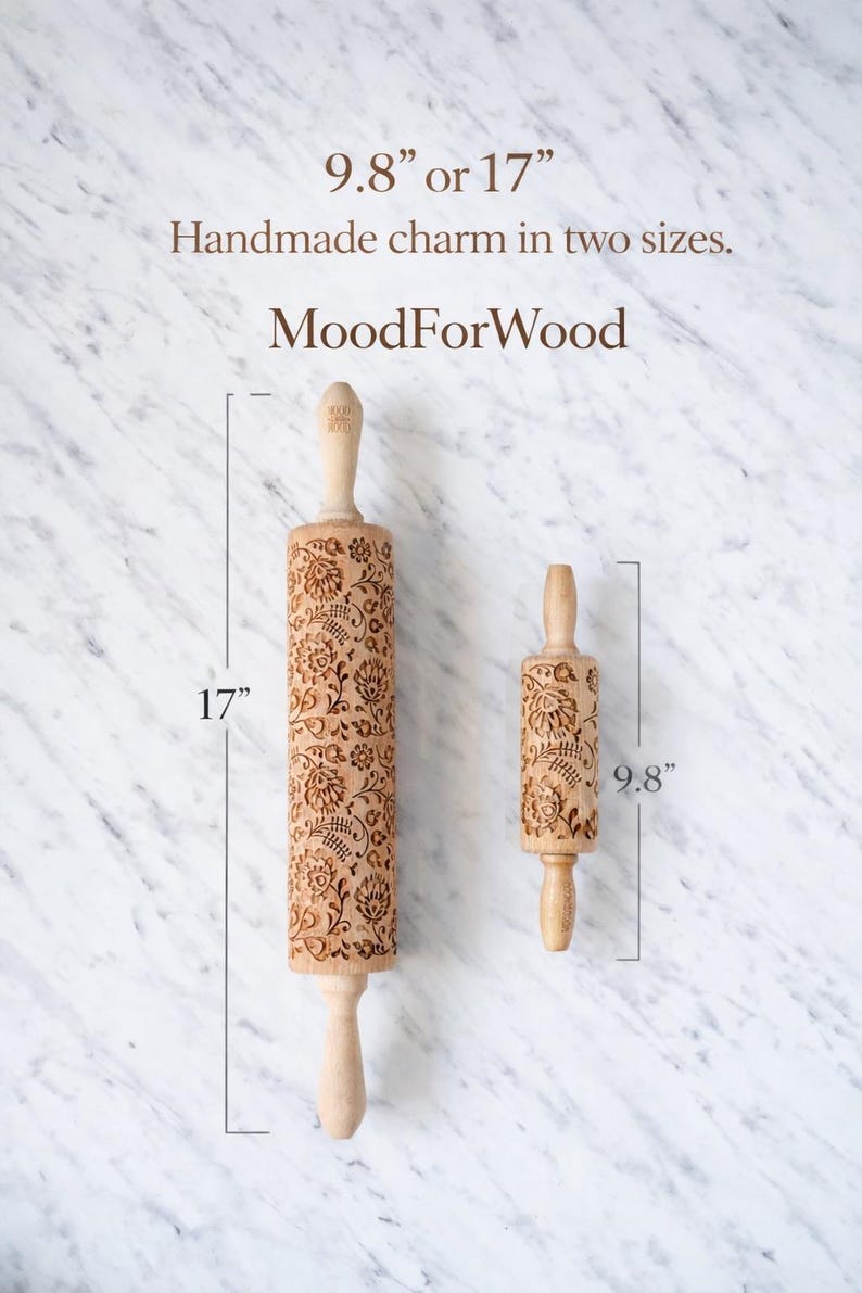 May include: Two wooden rolling pins with floral patterns, one 17 inches long and the other 9.8 inches long. The rolling pins have light-colored handles and are labeled "MoodForWood". The image also includes the text "Handmade charm in two sizes."