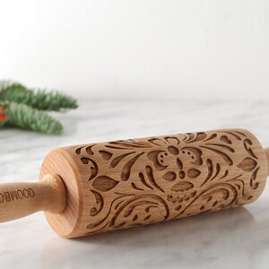 Mini wooden rolling pin with embossing design of norwegian rosemaling folk.