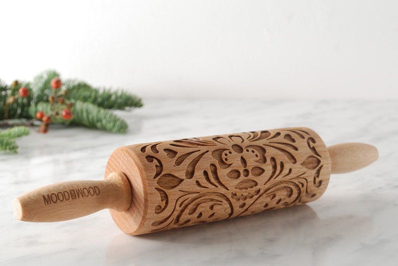 Mini wooden rolling pin with embossing design of norwegian rosemaling folk.