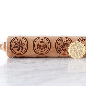 Rolling pin in use – imprinting designs on dough and gingerbread