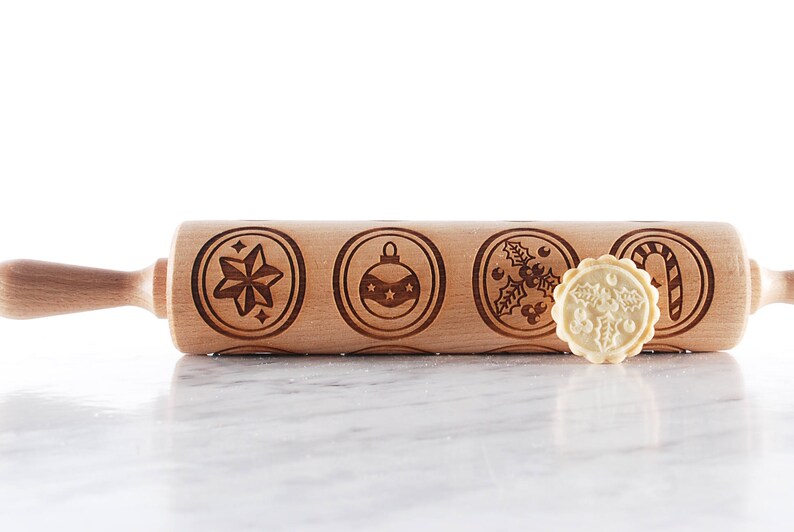 Rolling pin in use – imprinting designs on dough and gingerbread